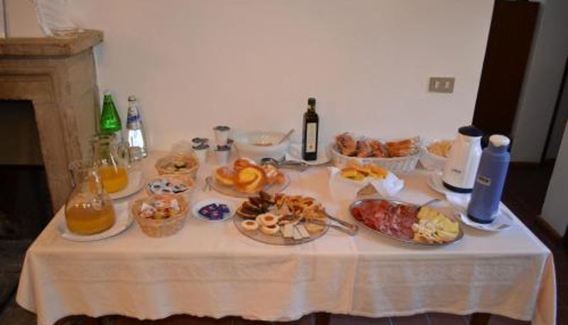 Sala śniadaniowa w restauracji - Agriturismo Montecorona