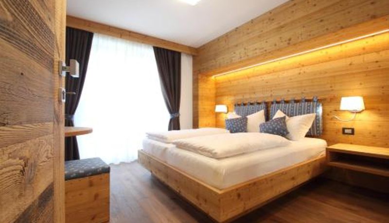 Zimmer - Apartments and SPA DOLOMITES B&B - Suites
