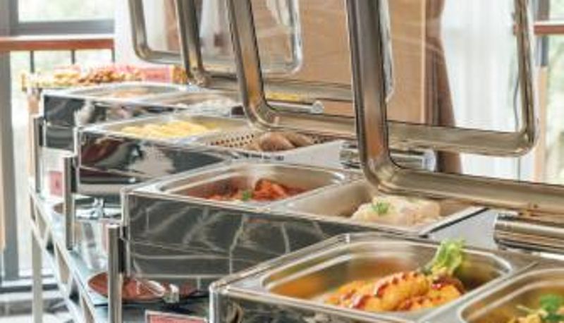Sala prima colazione all'interno del ristorante - White Swan Guest House MeiZhou