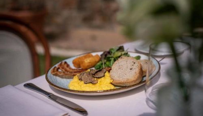 Salle de petit-déjeuner dans le restaurant - Poggio Paradiso Resort & Spa