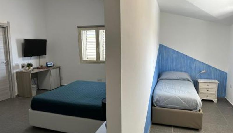 Habitación triple - LXR Rooms Carloforte
