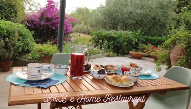 Sala de desayunos dentro del restaurante - B&B Il Giardino di Paola