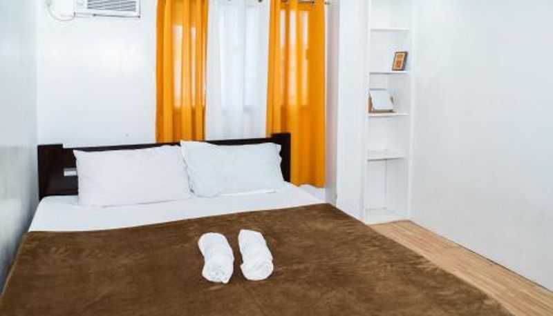 Zimmer - Charms Angels Homestay by RedDoorz