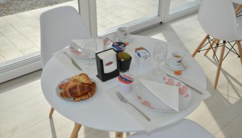 Sala de desayunos dentro del restaurante - Crystal B&B