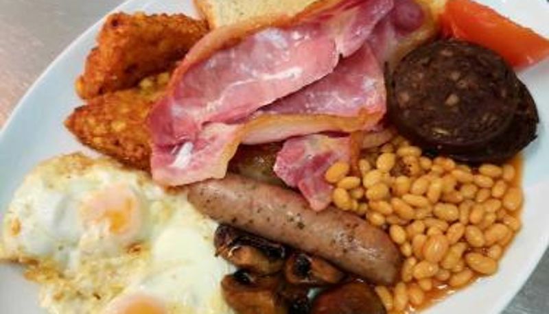 Salle de petit-déjeuner dans le restaurant - The Waterford Arms