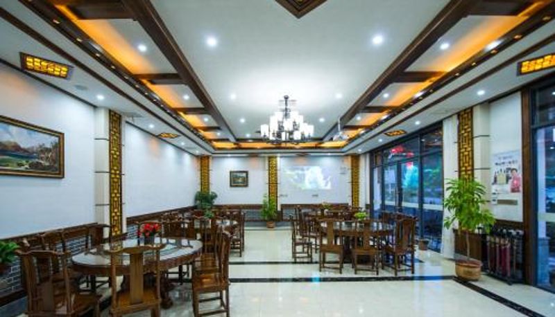 Frühstücksraum innerhalb des Restaurants - W_Smart Motel Superior Hongcun