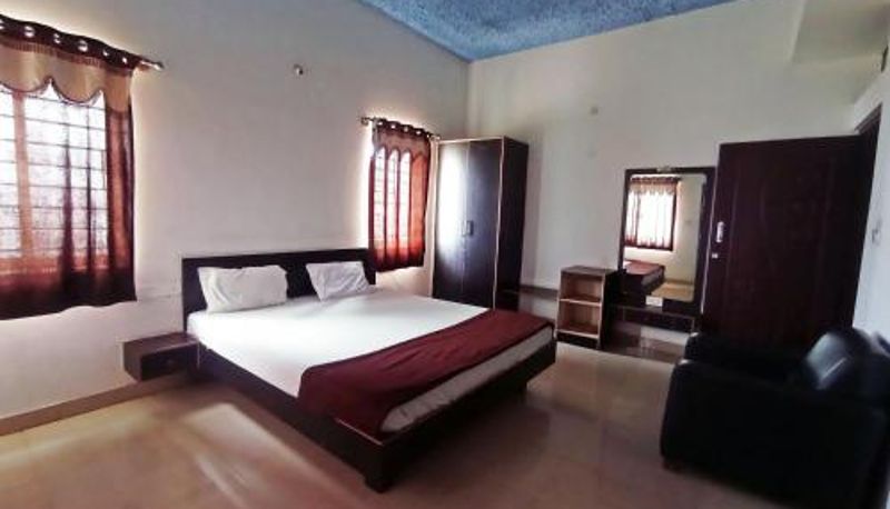 Zimmer - Savanur Deluxe Lodge