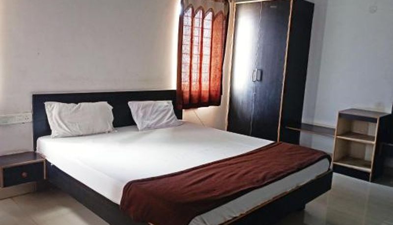 Chambre - Savanur Deluxe Lodge