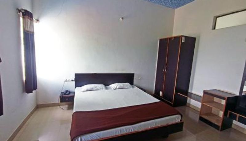Zimmer - Savanur Deluxe Lodge