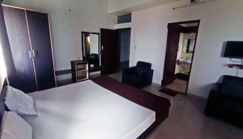 Zimmer - Savanur Deluxe Lodge