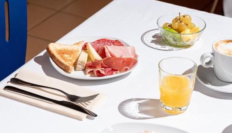 Ontbijtzaal in het restaurant - Phi Hotel Homy Druento