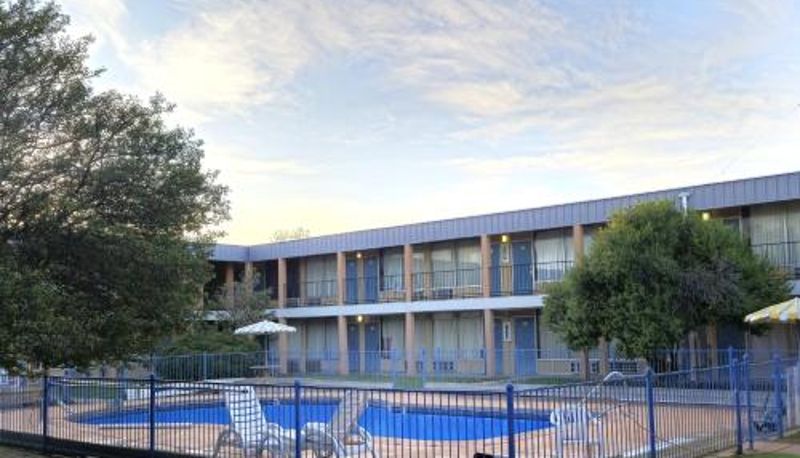 Pool - Castle inn & suites by OYO Lawton