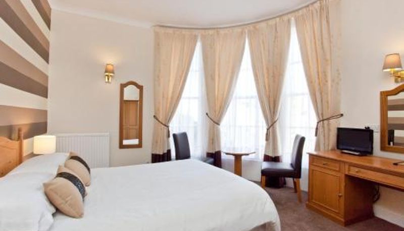 Habitación - The Dickens Bar & Inn