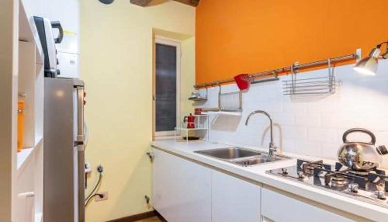 Kitchen - GuestHost - Piazza Napoleone Lovely Central Apartment