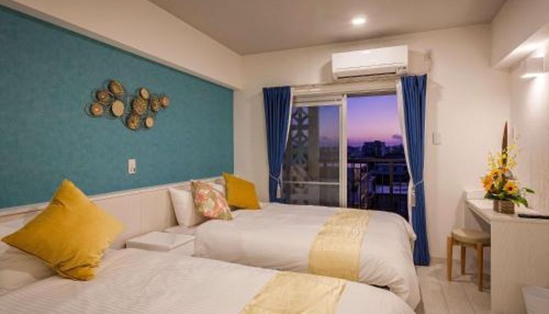 Habitación triple - Kariyushi Condominium Resort Miyakojima Fukugi Stays