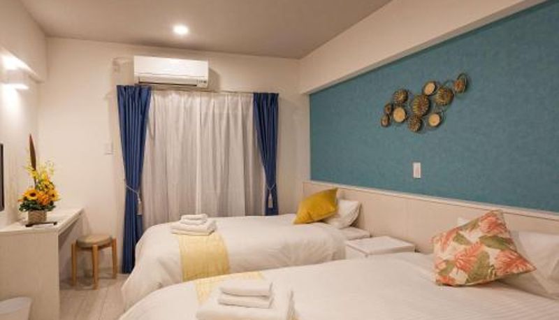 Zimmer - Kariyushi Condominium Resort Miyakojima Fukugi Stays