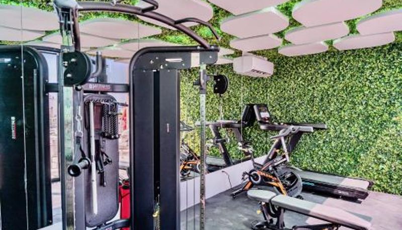 Zona de bienestar y gimnasio - Coco beach by Casago