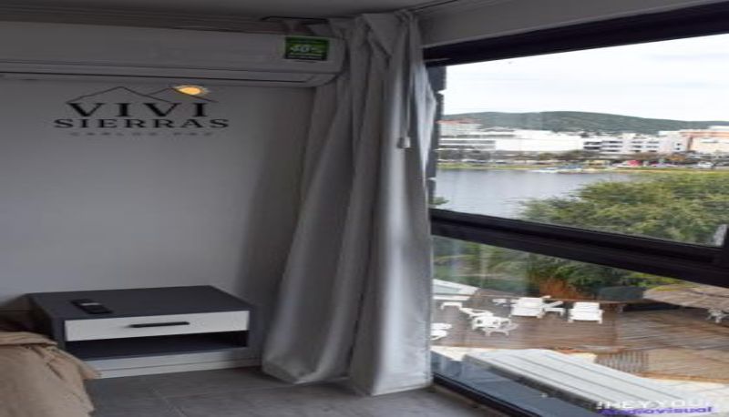 Habitación estándar - vista panorámica  minipileta climatizada  Piso 4 frente al lago Centro Villa Carlos Paz Vivisierras