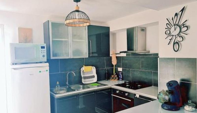 Kitchen - parking privé Appartement confortable à Raismes - 60 m²