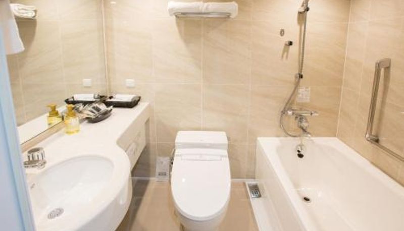 Badezimmer - Okayama International Hotel