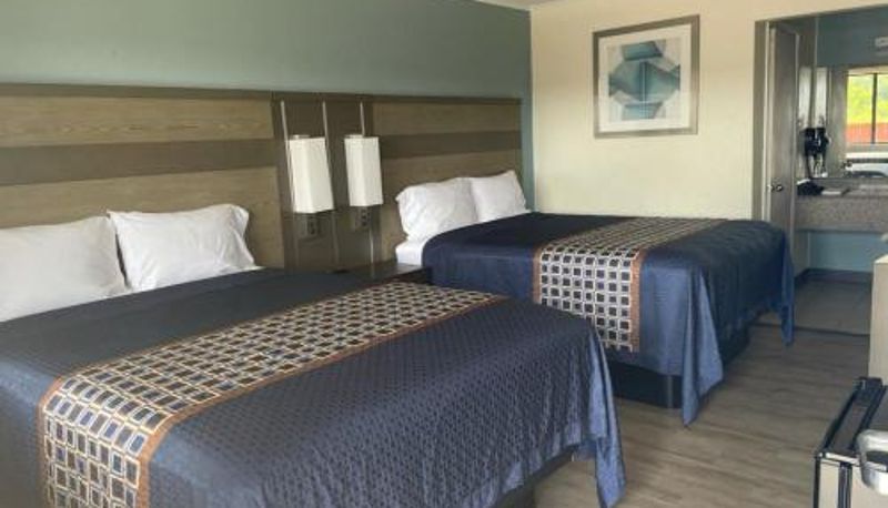 Bilgi - Executive Inn & Suites