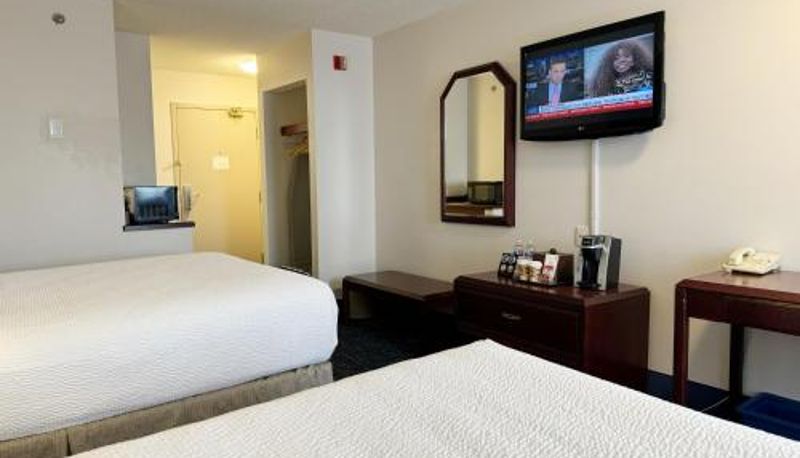 Quarto - Divya Sutra Plaza and Conference Centre Calgary Airport