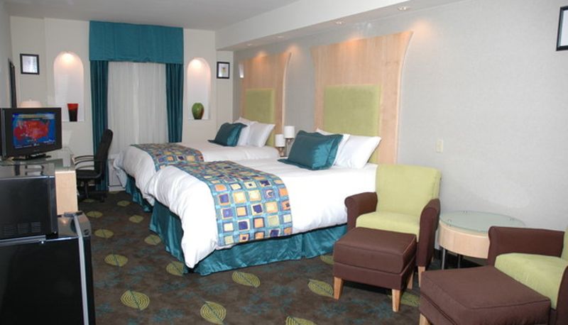 Room - The Grand Savannah Hotel