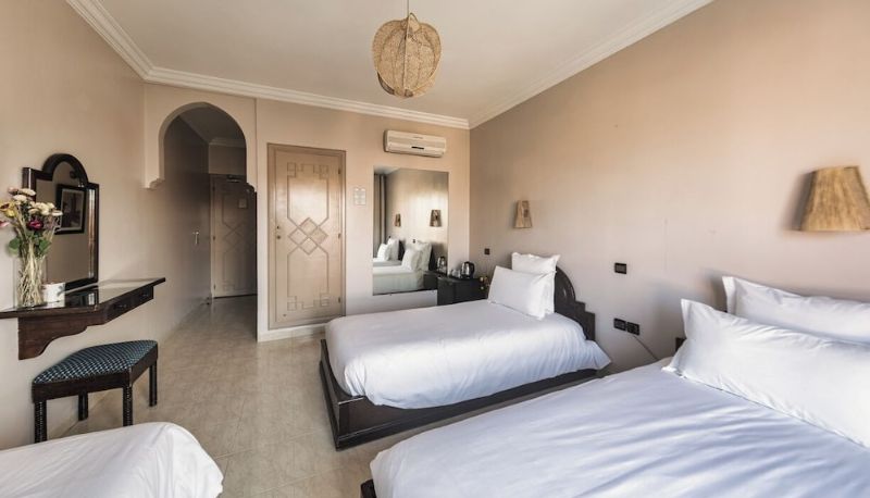 Quarto triplo - Amani Hotel Suites & Spa