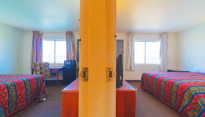 Zimmer - Castle Inn & Suites By OYO