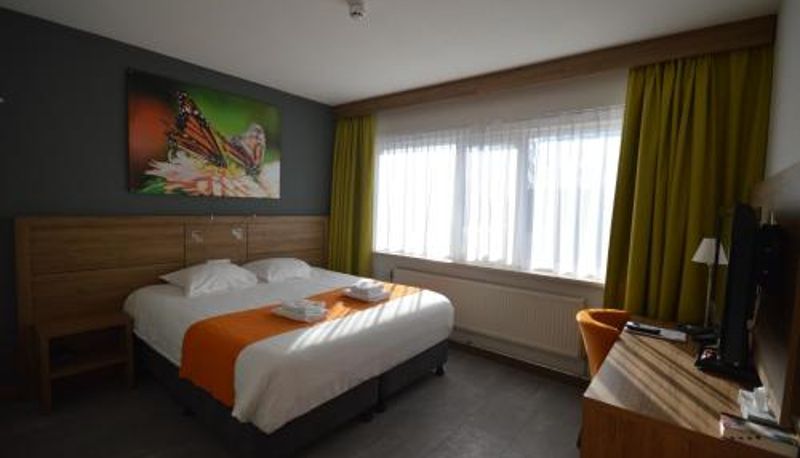 Quarto - Atlas Hotel Holiday