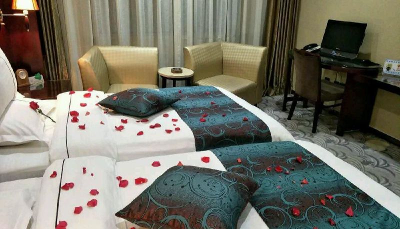 Chambre - Xiyuan Holiday Inn