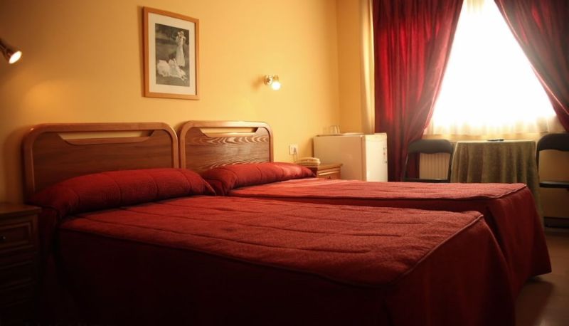 Dreibettzimmer - La Poetisa