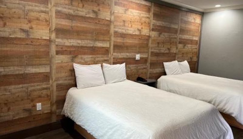 Info - The Symphony Inn & Suites