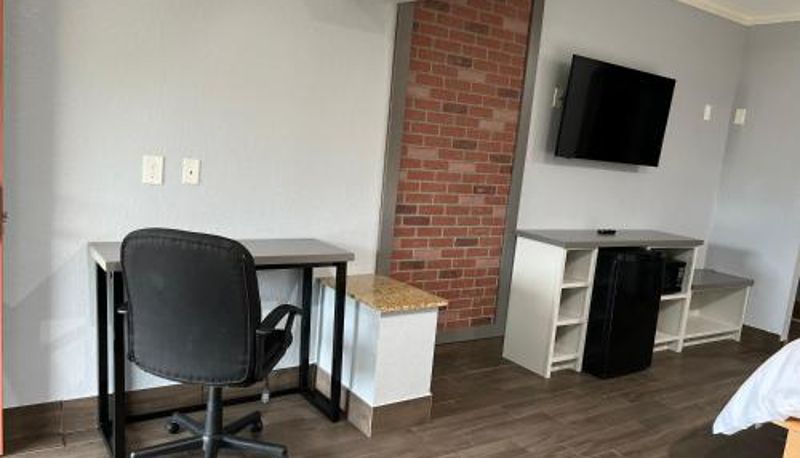 Info - The Symphony Inn & Suites