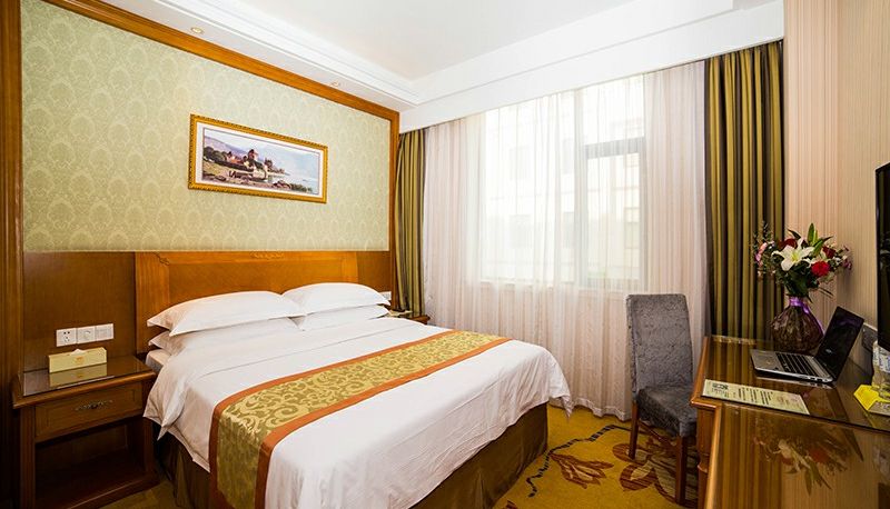 Zimmer - Vienna Classic Hotel(Shandong Yantai Jinshatan Taishan Road Hotel)