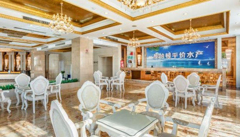 Zona de bienestar y gimnasio - Manhattan International Hotel