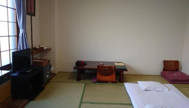 Zimmer - Hotel Izumi