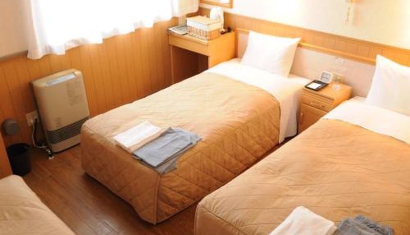 Chambre triple - Lasting Hotel