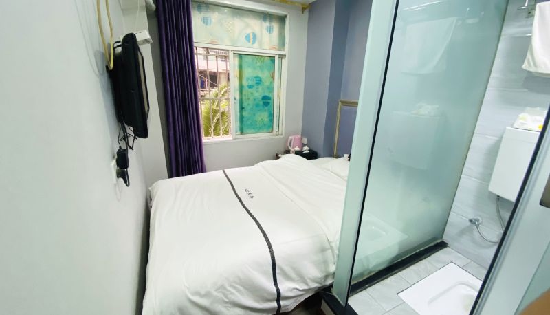 Habitación - Xin Le Mei Business Hotel