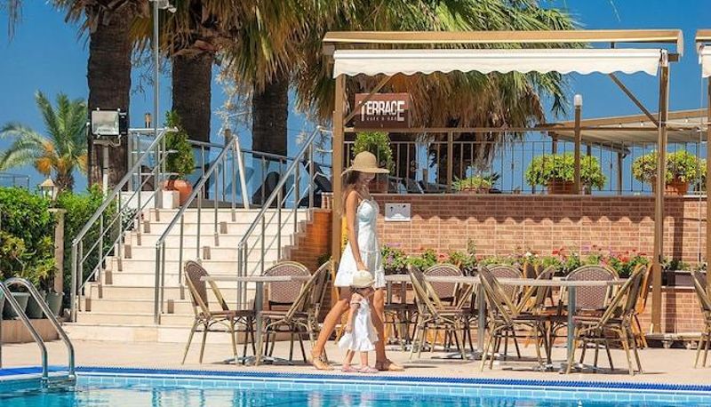 Zwembad - Palm Hotel