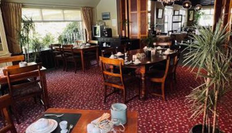 Salle de petit-déjeuner dans le restaurant - De Herberg van Anderen
