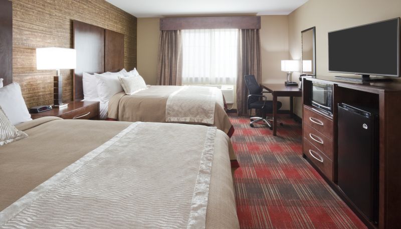 Zimmer - GrandStay Hotel and Suites Tea