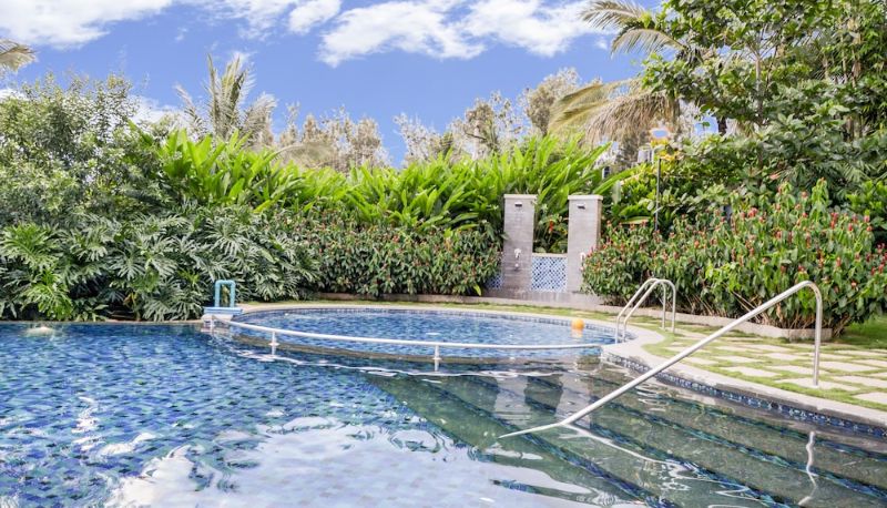 Pool - Purple Palms Resort & Spa Coorg a member of Radisson Individuals Premier