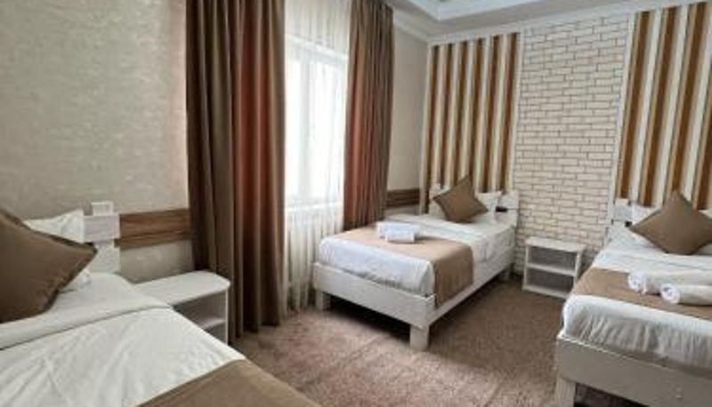 Driepersoonskamer - Kausar Hotel