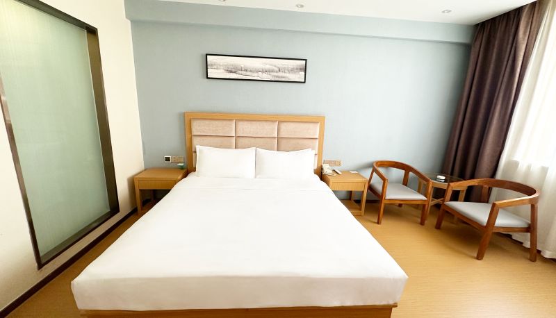 Zimmer - Xingcheng Luoyang Peony Square Subway Station Hotel