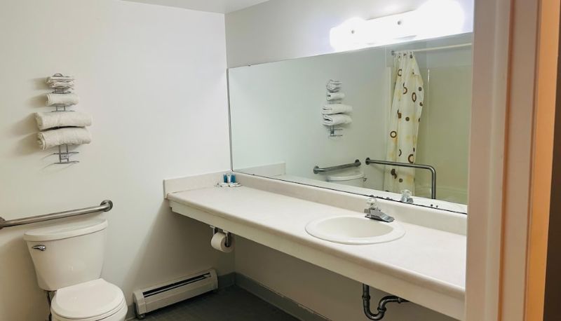 Appartement - Capital O Swan Inn Comstock Park