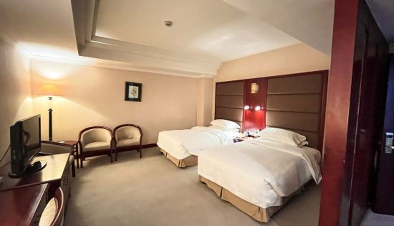 Kamer - Grand Hotel Overseas Traders Club