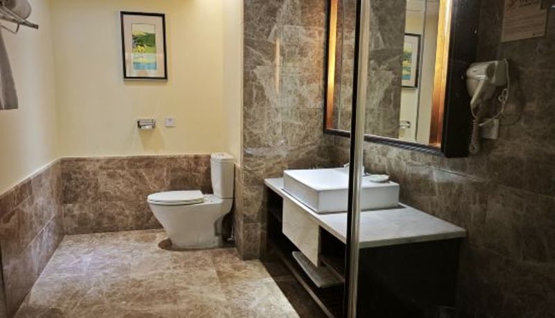 Habitación - Holiday Hotel