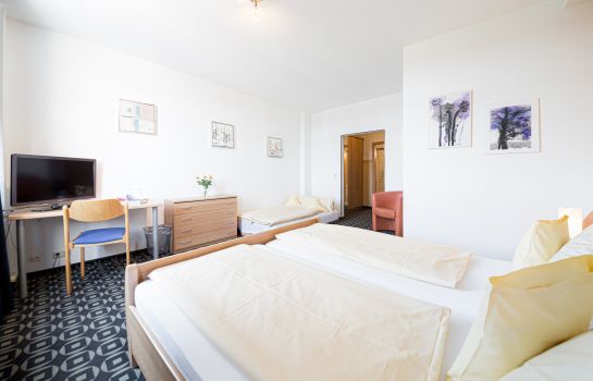 Four-bed room Europa Business & Events