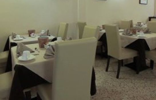 Sala de desayuno Villa Costanza Superior Rooms